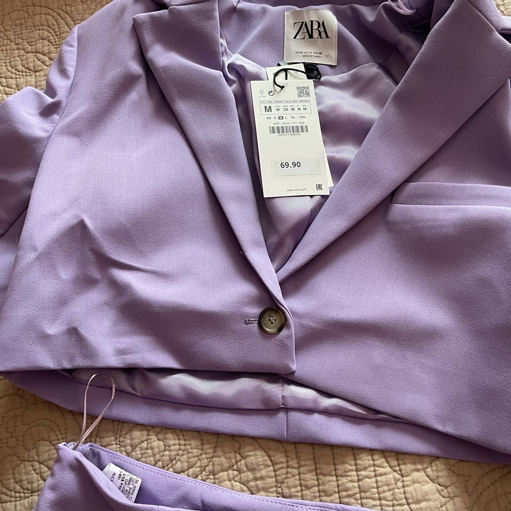 short set beautiful shade of lavender. Nicely made never worn received a gift.
